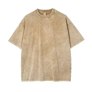 A plain beige oversized t-shirt with a enzyme acid wash texture and drop shoulders.
