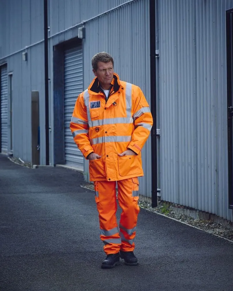 male wearing custom orange hi vis jacket