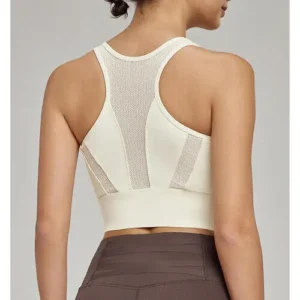The back view of an off-white sports bra featuring a racerback design with breathable mesh panels for high-intensity workouts.