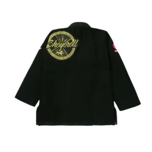 The back of a black premium Gi featuring a large circular gold embroidered "Shoyoroll" patch and red brand accents on the sleeves.
