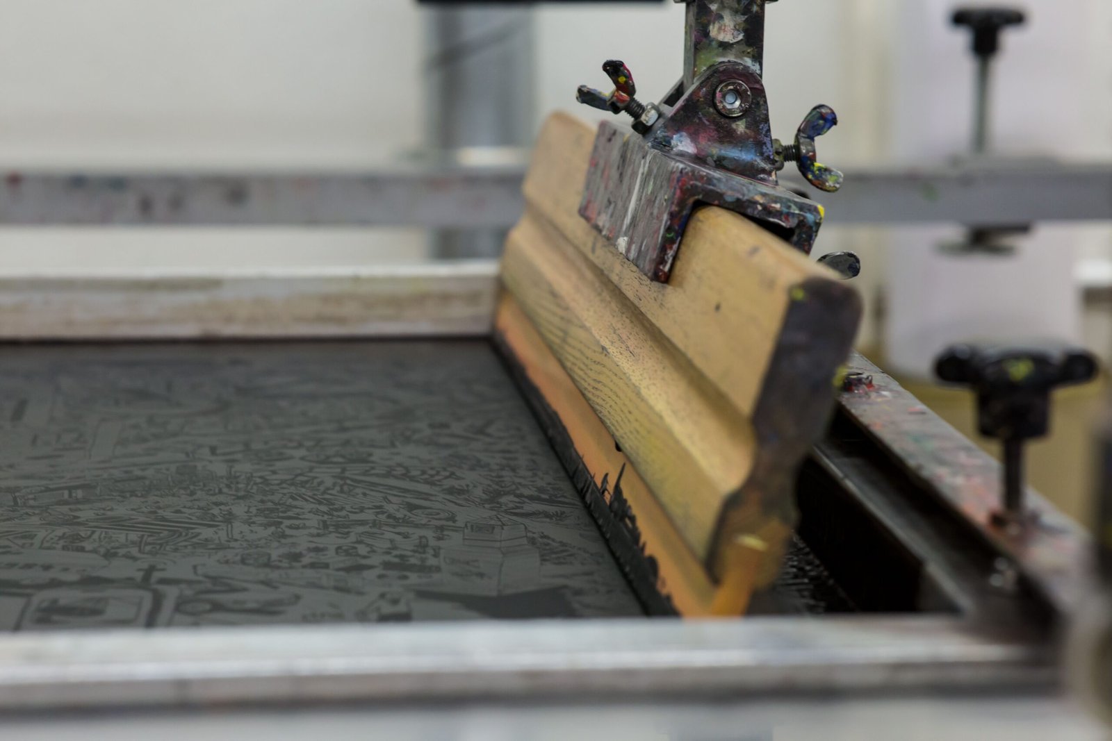 Custom screen printing process at Zedline Apparel factory in Sialkot, Pakistan